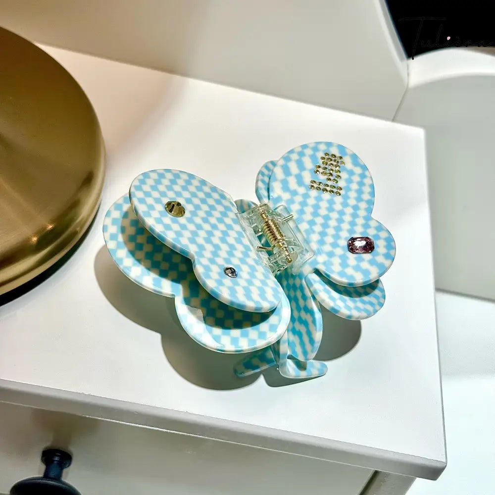 Világoskék kockás pillangó hajcsat